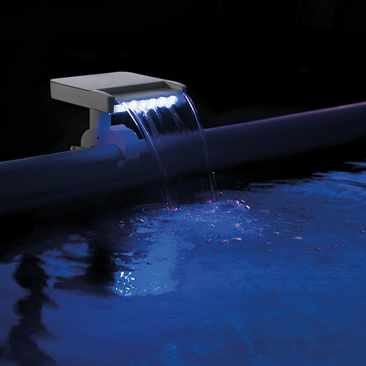 LED light fixture on a pipe with water flowing, set against a dark background