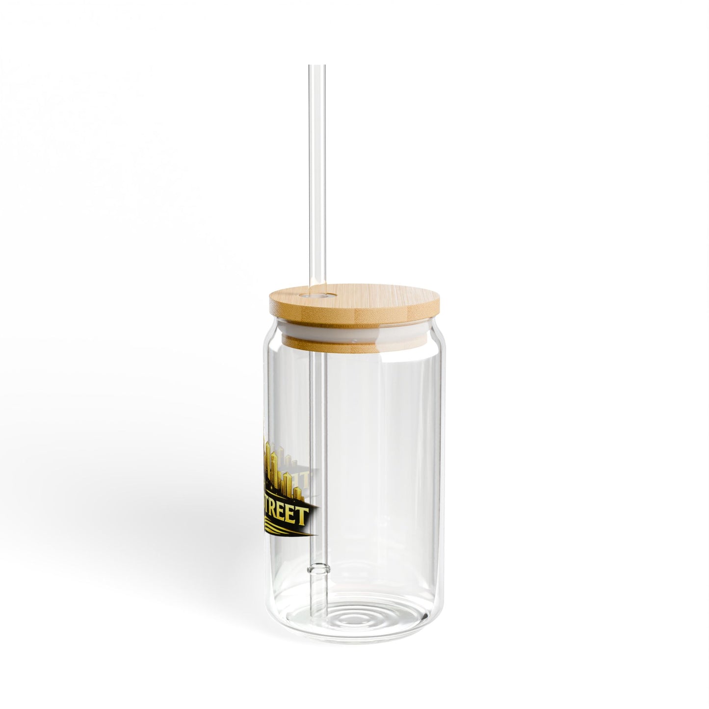 Clear glass tumbler with a wooden lid and straw on a white background