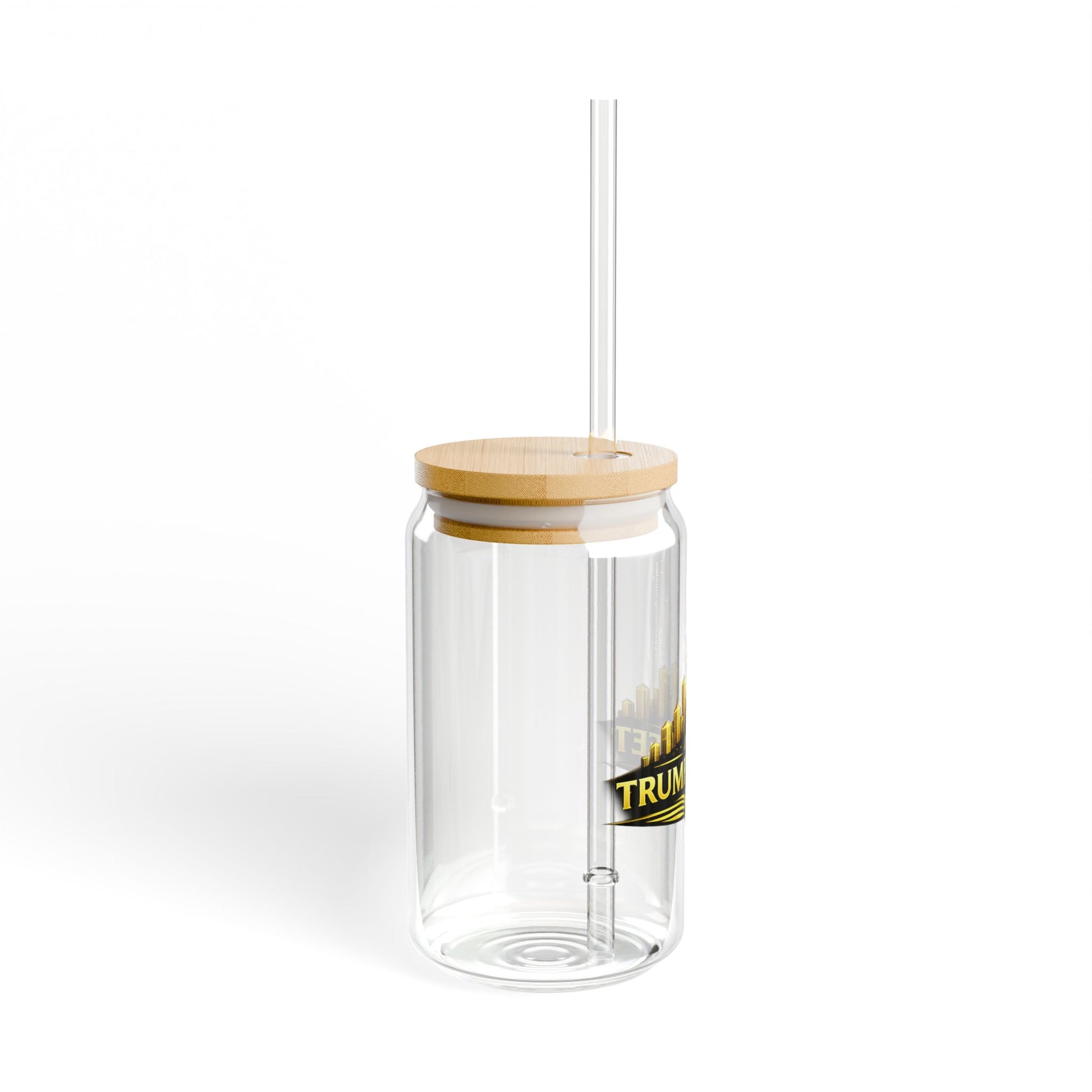 Clear glass tumbler with a wooden lid and straw on a white background