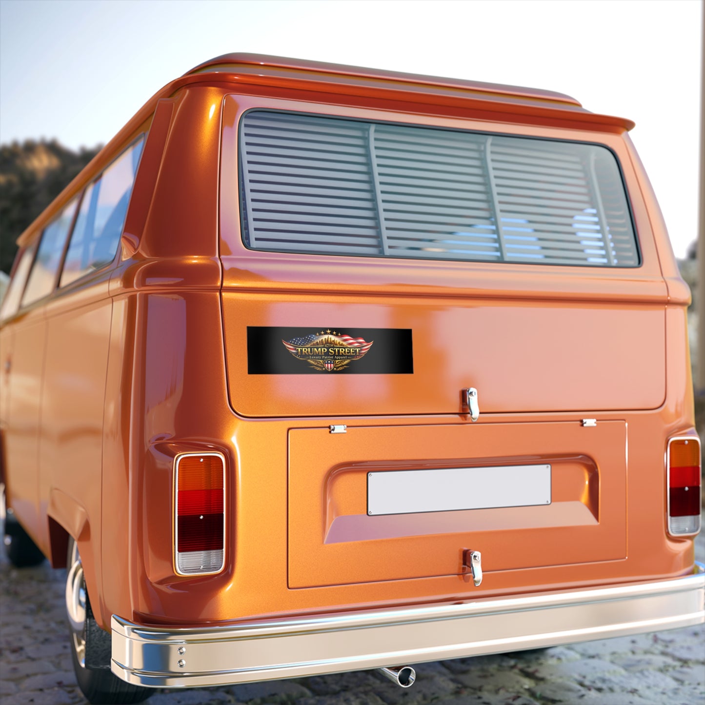 Orange vintage van with a visible brand logo on a blurred background