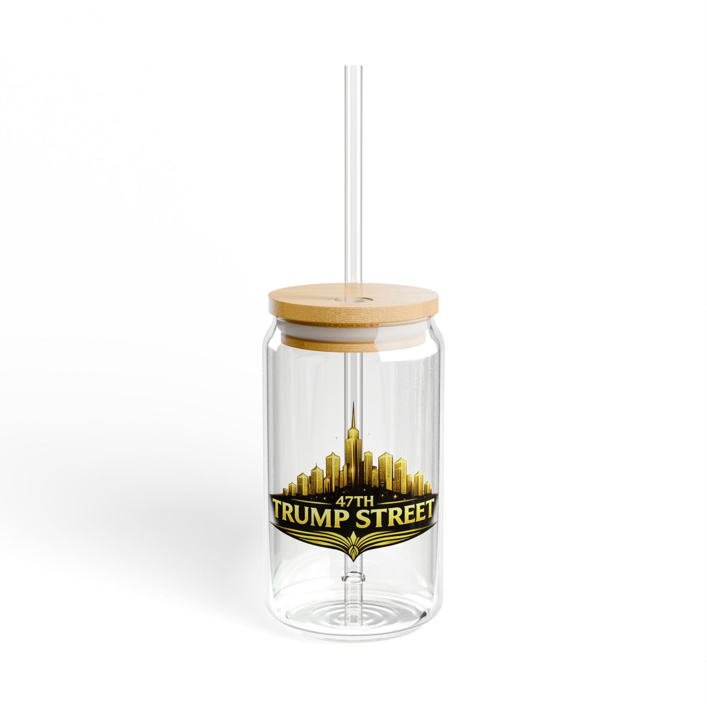 Clear tumbler with wooden lid and straw featuring '47th Trump Street' design on a white background