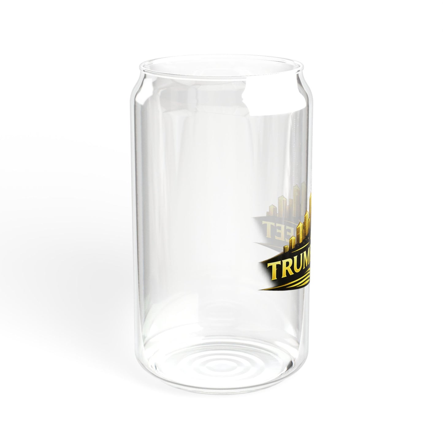 Clear glass with a gold and black 'Trump' logo on a white background
