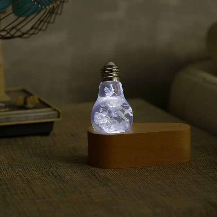 Handcrafted EP Light resin LED bulbs glowing in ambient decorative lighting setup