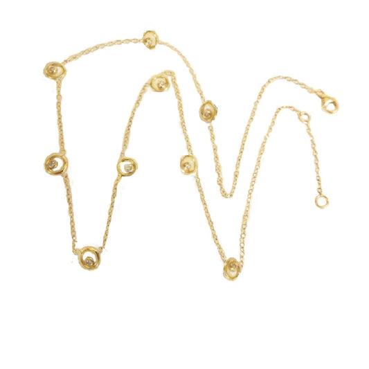 Karma Chain 14K gold ripple diamond necklace symbolizing connection and energy