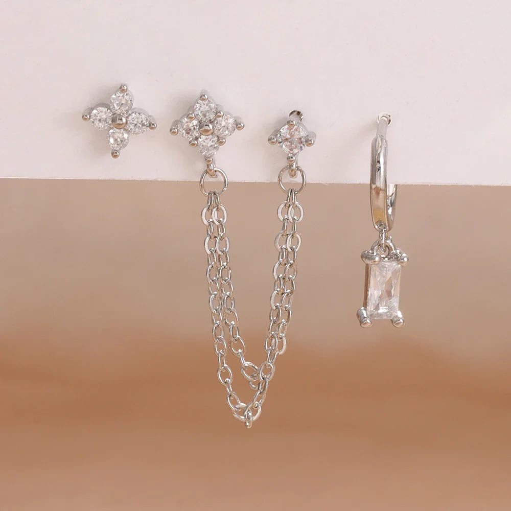 Celestial zodiac birthstone earring set in silver with gemstone accents and elegant chain detail