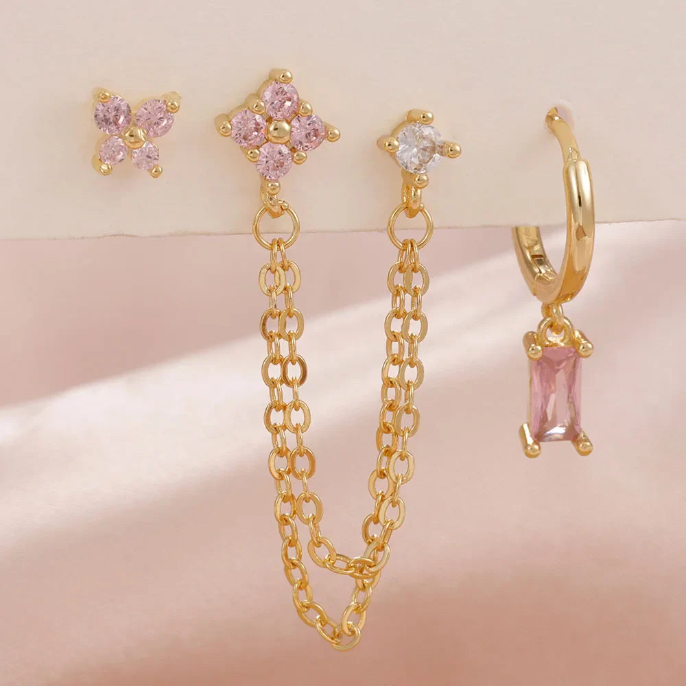 Celestial zodiac birthstone earring set in gold with gemstone accents and elegant chain detail