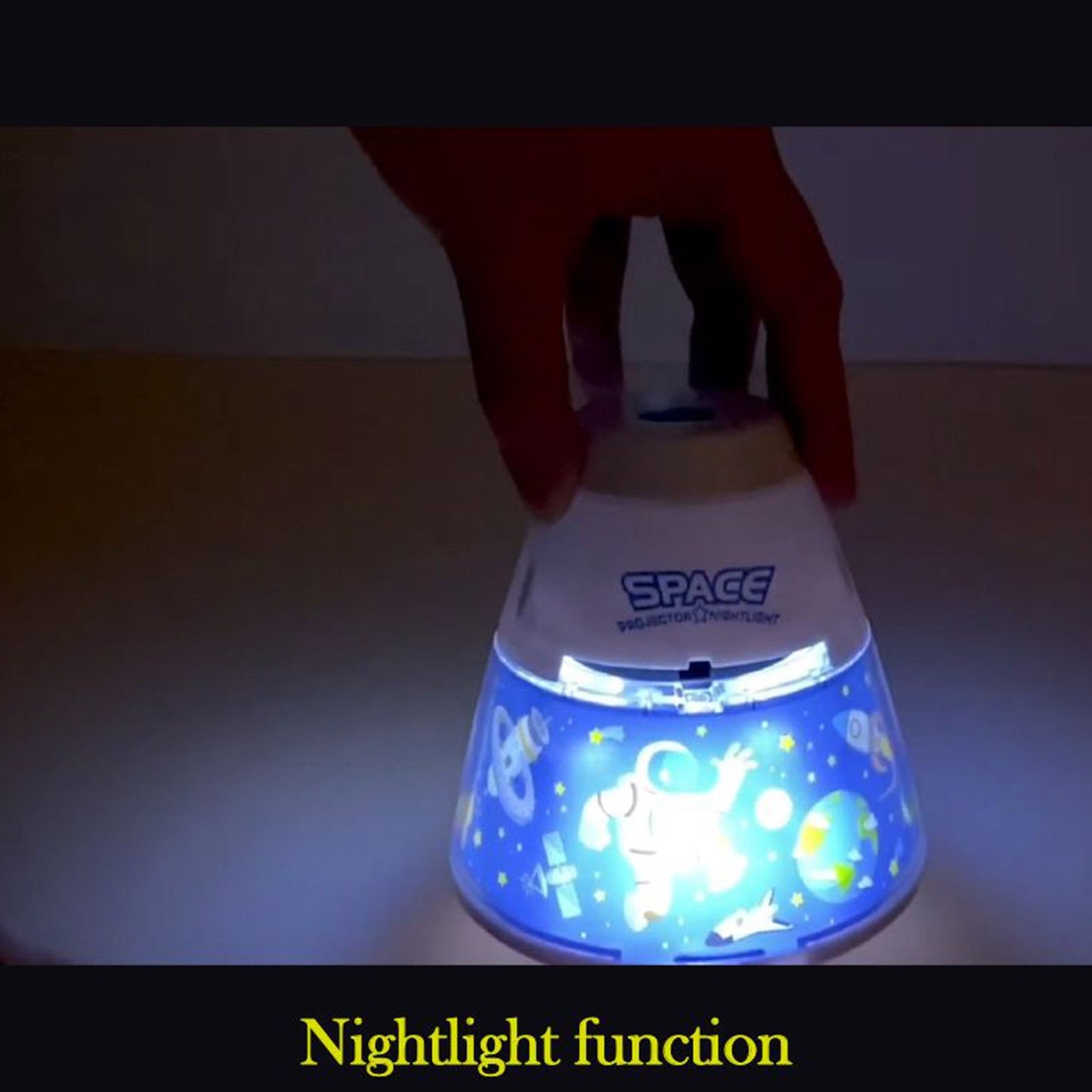 Space capsule projector night light with colorful space image projection and blue base for kids room cosmic decor