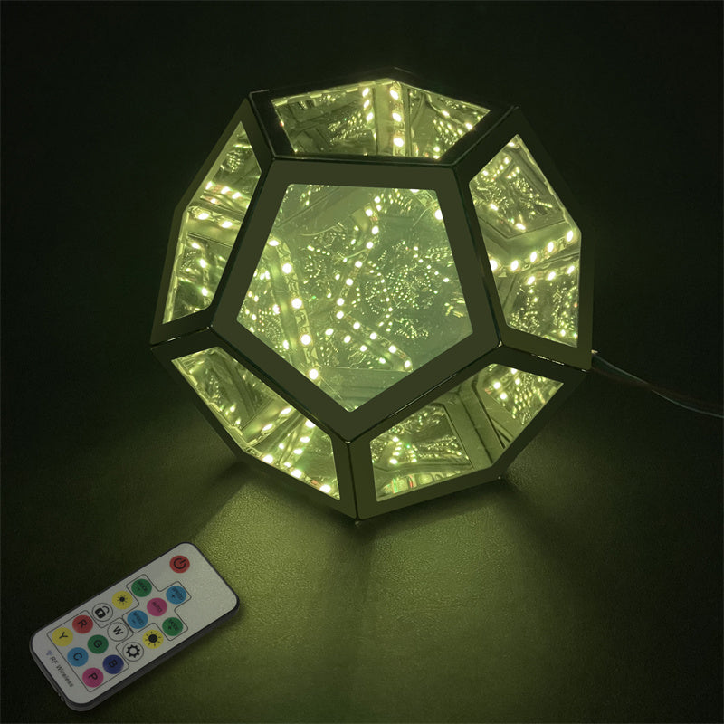 Geometric LED lamp with remote control on a dark background