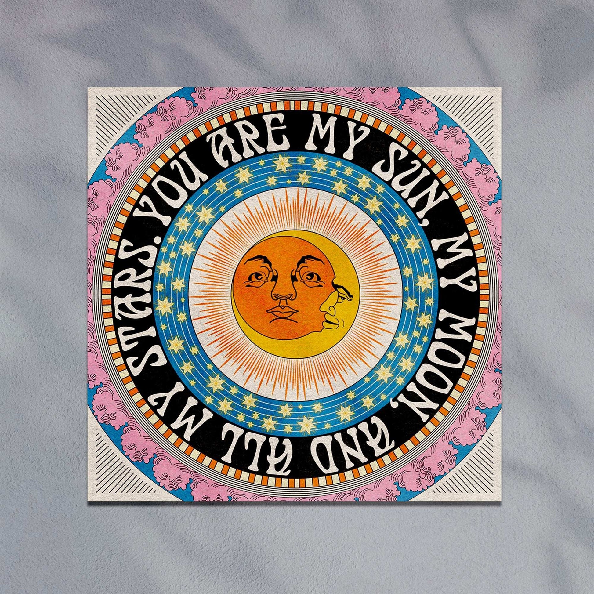 Square celestial art print featuring sun, moon, and stars design with inspirational quote